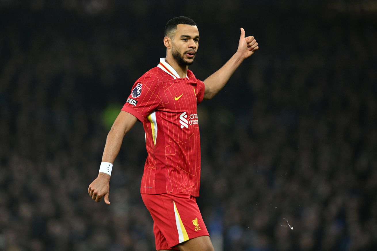 Cody Gakpo of Liverpool gestures during the Premier League match between Everton FC and Liverpool FC at Goodison Park on February 12, 2025 in Liverpool, England.