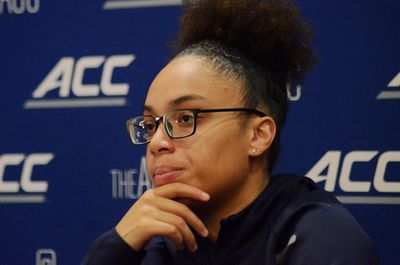 Notre Dame guard Olivia Miles takes in questions from reporters at the 2024 ACC Tip-Off in Charlotte, N.C.