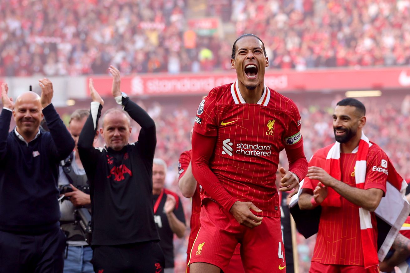 Virgil van Dijk of Liverpool celebrates the teams victory and confirmation of winning the Premier League title in the Premier League match between Liverpool FC and Tottenham Hotspur FC at Anfield on April 27, 2025 in Liverpool, England.